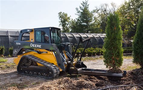 digging trees with skid steer|big john skid steer attachment.